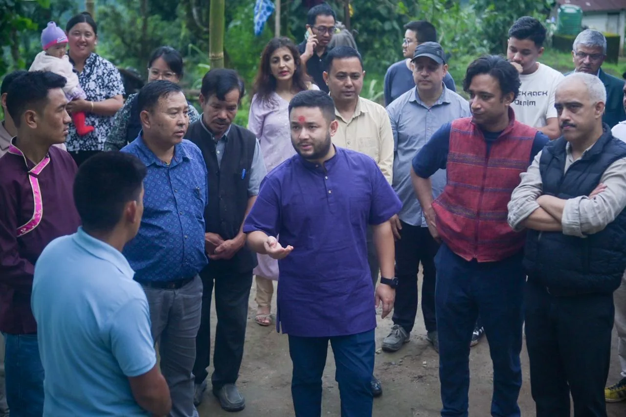 Officials and villagers gathered on the village path on opening day
